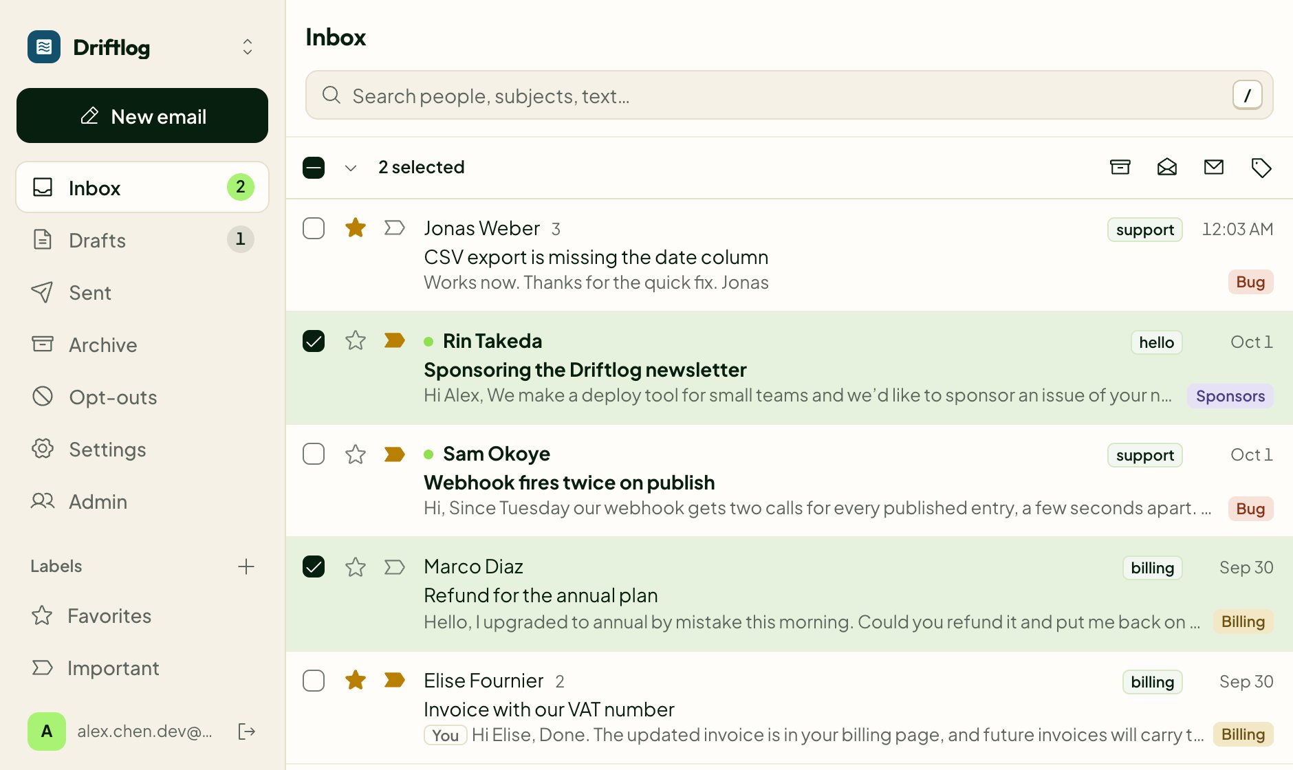 An inbox with two conversations ticked and a toolbar to archive, mark read or label them. Each conversation carries a colored label.