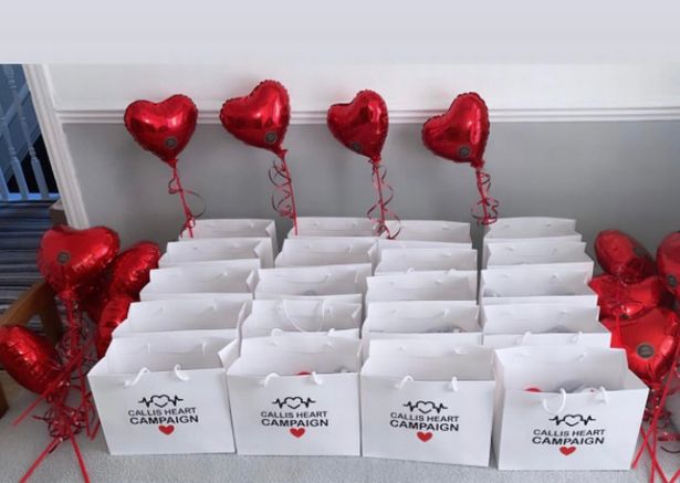 Twenty personalized Valentine's gifts with red hearted balloons