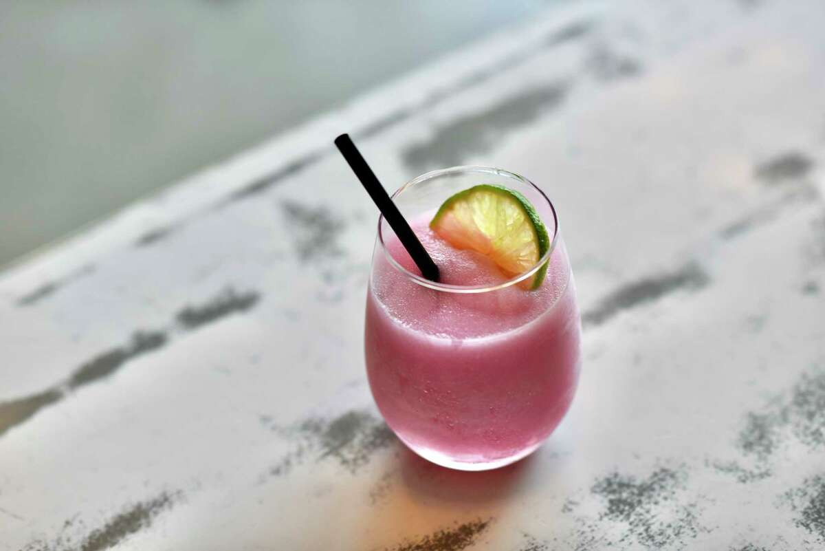 Dish Society's prickly pear frozen margarita is a national Margarita Day option with multiple locations throughout Houston.