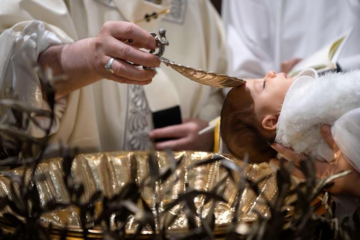 Pope Francis baptizes a baby in the Sistine Chapel (not related to actual story)