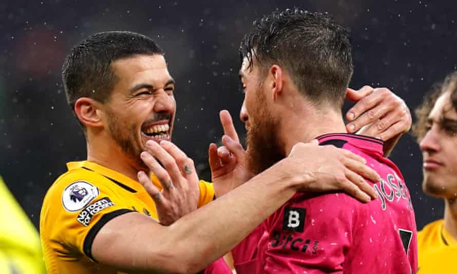 Wolves’ Conor Coady and José Sá celebrate their victory.