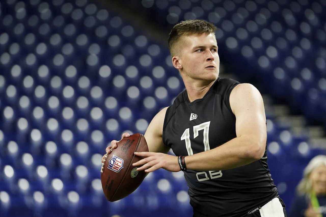 Western Kentucky quarterback Bailey Zappe (17) participates in a drill at the NFL football scouting combine.