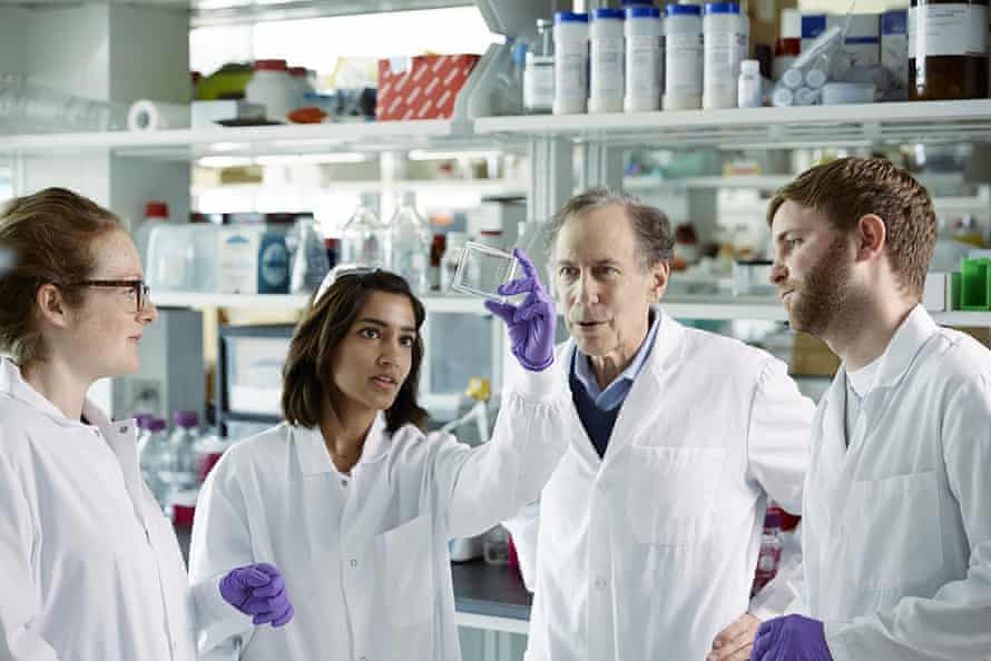 Langer with students at MIT, where he runs a lab of more than 100 researchers.