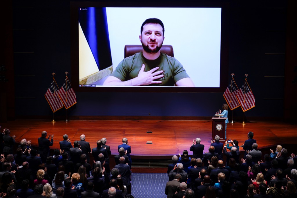 Speaker of the House Nancy Pelosi, D-Calif., introduces Ukrainian President Volodymyr Zelenskyy to speak to the U.S. Congress by video at the Capitol in Washington.