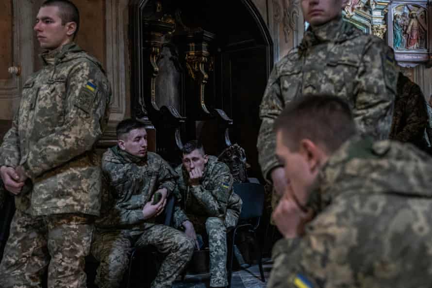 Young soldiers at the funeral of four Ukrainian men.