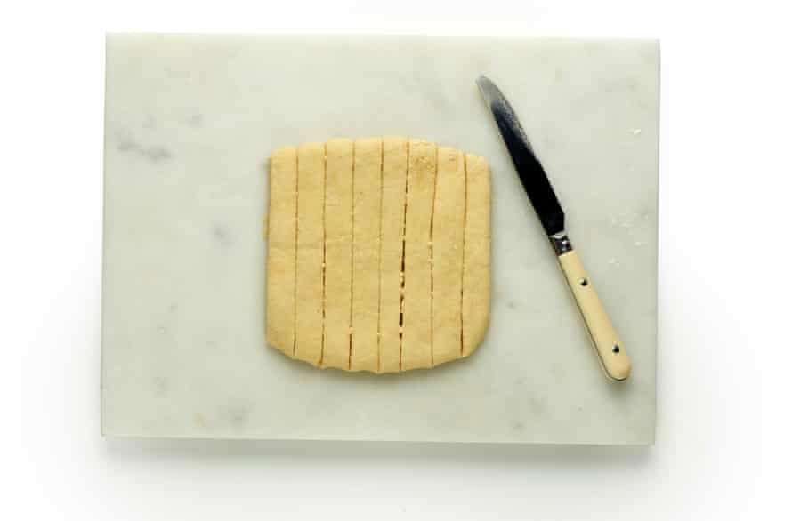 Felicity Cloake's gnocchi masterclass, step8.  Cut the square of dough into strips.