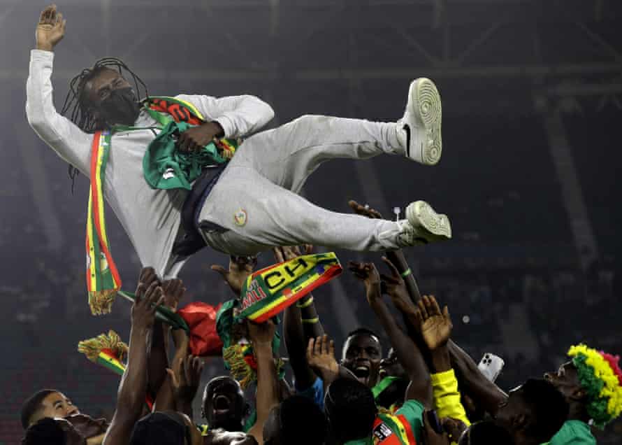 Senegal's head coach, Aliou Cissé, gets a lift after his team win the Africa Cup of Nations final.