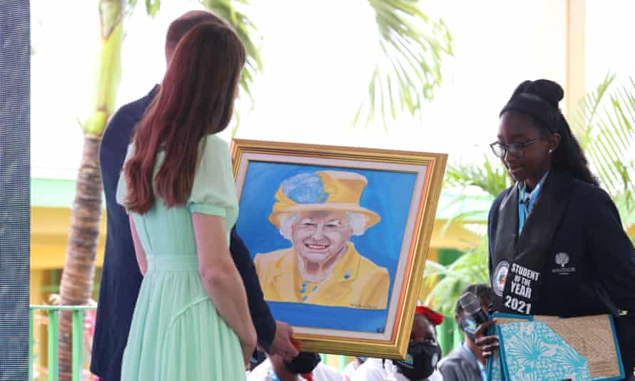 The Duke and Duchess of Cambridge view a portrait of the Queen during a visit to Sybil Strachan primary school in Nassau, the Bahamas.