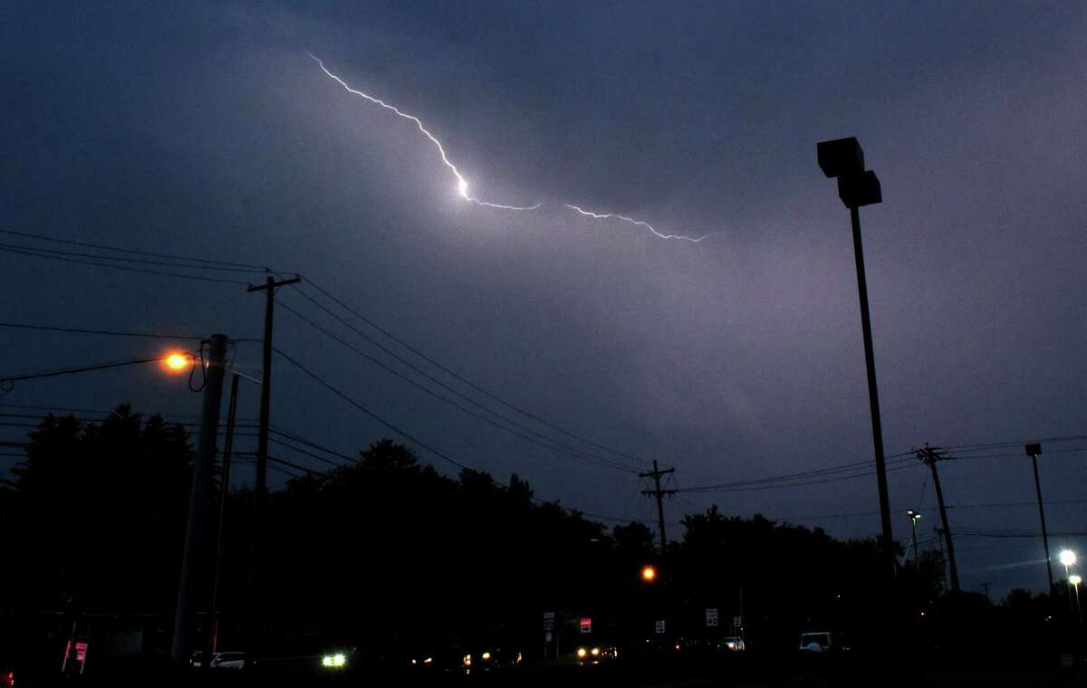 The National Weather Service issued a thunderstorm watch Thursday for Albany County, the Hudson Valley as well as the northern New York City suburbs, New Jersey and Pennsylvania. In this photograph, lightning illuminates the sky over Western Avenue  Aug. 13, 2021 in Guilderland.