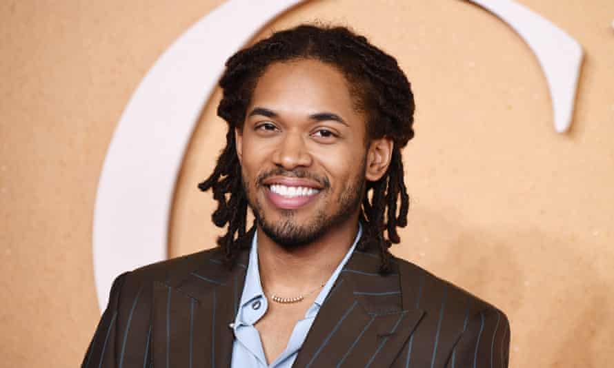Kelvin Harrison Jr poses for a photo at the premiere for Cyrano.