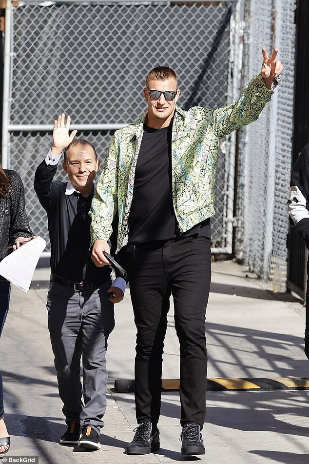 Good sport: Also seen arriving at Jimmy Kimmel's studio on Wednesday afternoon was the NFL star Rob Gronkowski, who apparently didn't mind walking the short distance to the door