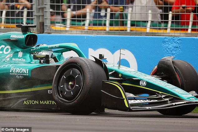 The damage is visible to the front-right wheel of Stroll's Aston Martin after he turned into the Williams of Latifi as it passed during the first session of qualifying