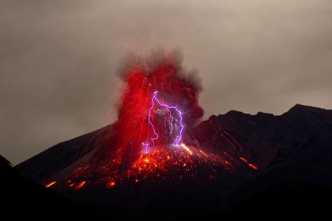 Dirty storm with lightning in a volcano