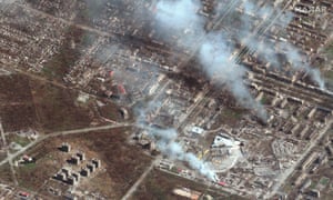 This satellite image released on April 12, shows buildings on fire in eastern Mariupol, Ukraine, on April 9.