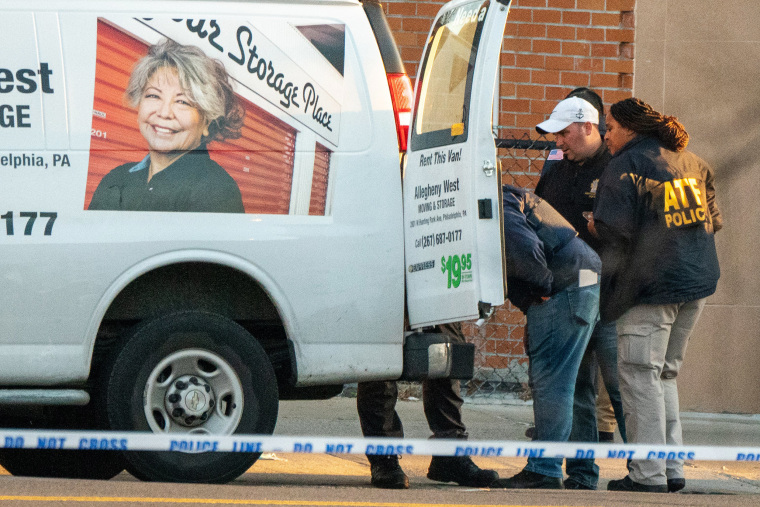 Image: Members of the NYPD bomb squad inspect a U-Haul van believed to be linked to the suspect of a shooting on April 12, 2022 in New York City.