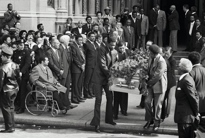 Robinson’s old teammates,along with Russell, carried the casket at his funeral in 1972.