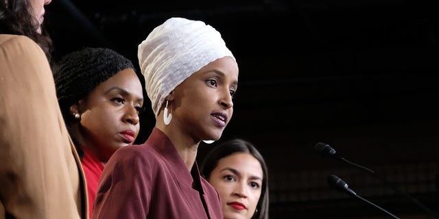 U.S. Rep. Ilhan Omar (D-MN) speaks as Rep. Rashida Tlaib (D-MI), Rep. Ayanna Pressley (D-MA), and Rep. Alexandria Ocasio-Cortez (D-NY) listen during a press conference at the U.S. Capitol on July 15, 2019, in Washington, DC. (Photo by Alex Wroblewski/Getty Images)