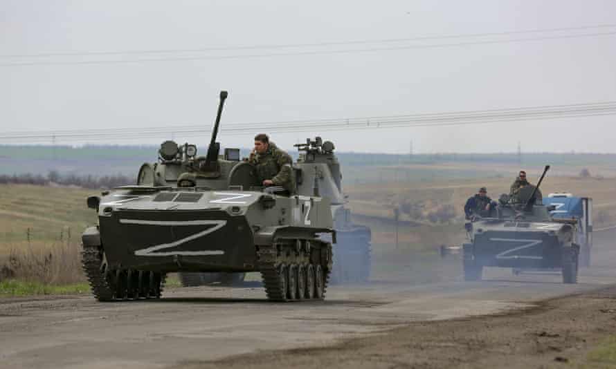 Russian military vehicles on a highway near Mariupol