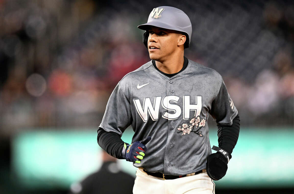 Juan Soto of the Washington Nationals walks to the dugout during the game against the New York Mets at Nationals Park on April 9, 2022 in Washington, DC. The Nationals unveiled their City Connect uniforms in 2022.