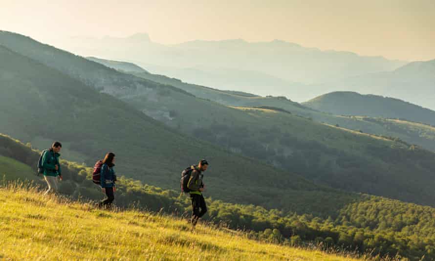 People trekking on a mountain slope