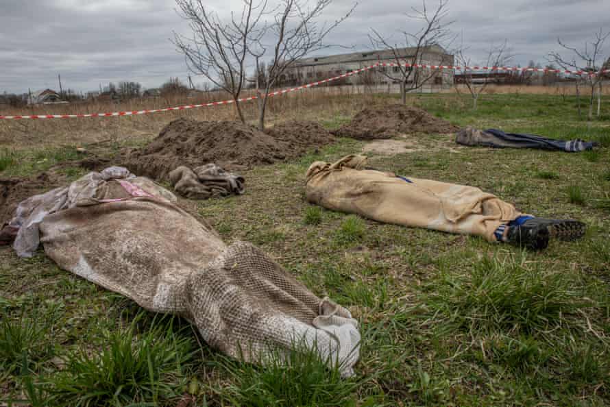 The bodies of civilians allegedly killed by the Russians in Borodianka.  Fragments of cluster munitions are being found in bodies dug out in the area and being classified by forensic doctors.