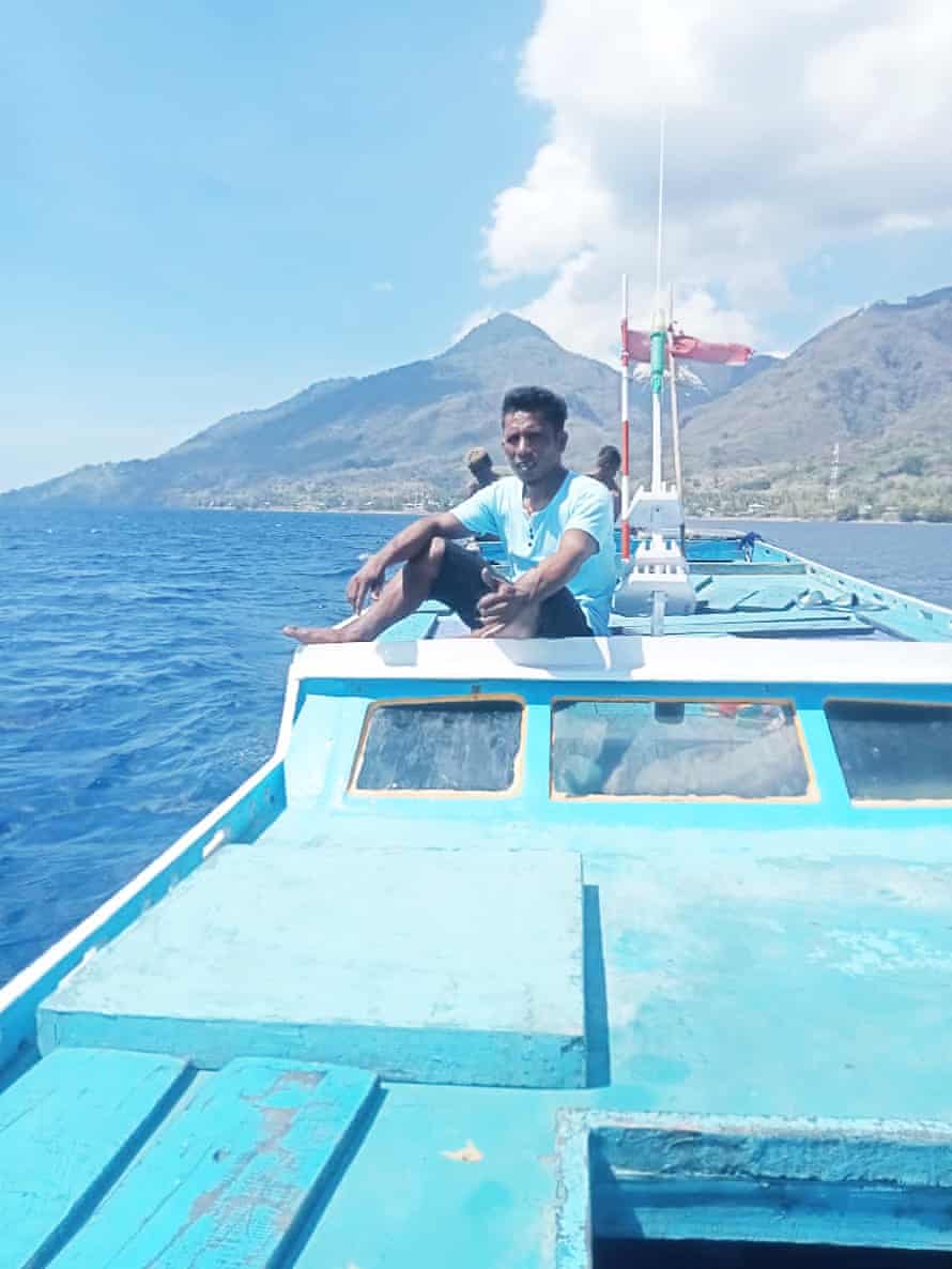 Usman Ari on a boat