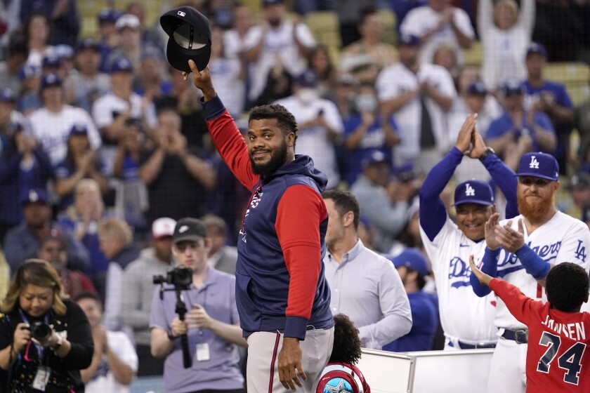 Atlanta Braves relief pitcher and former Dodgers closer Kenley Jansen acknowledges the crowd.