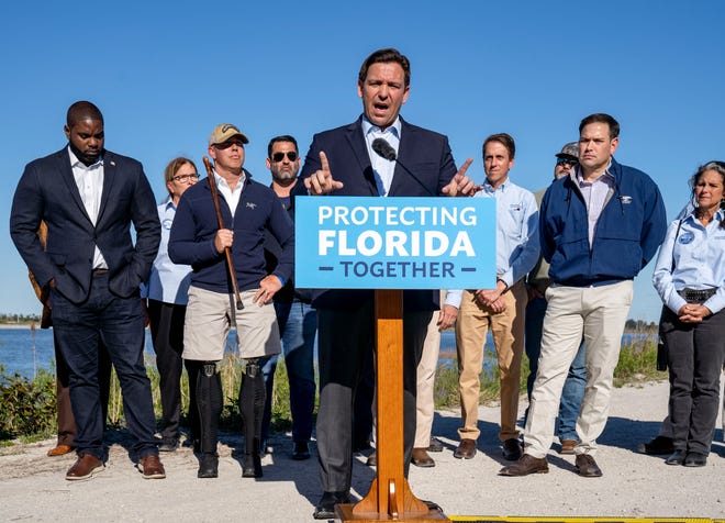 Florida Governor Ron DeSantis speaks during a press conference with Congressman Byron Donalds ,left, Congressman Brian Mast,  SFWMD Chairman Chauncey Goss next to Senator Marco Rubio, far right, at a stormwater treatment area in western Palm Beach County, Florida on January 31, 2022. 
 