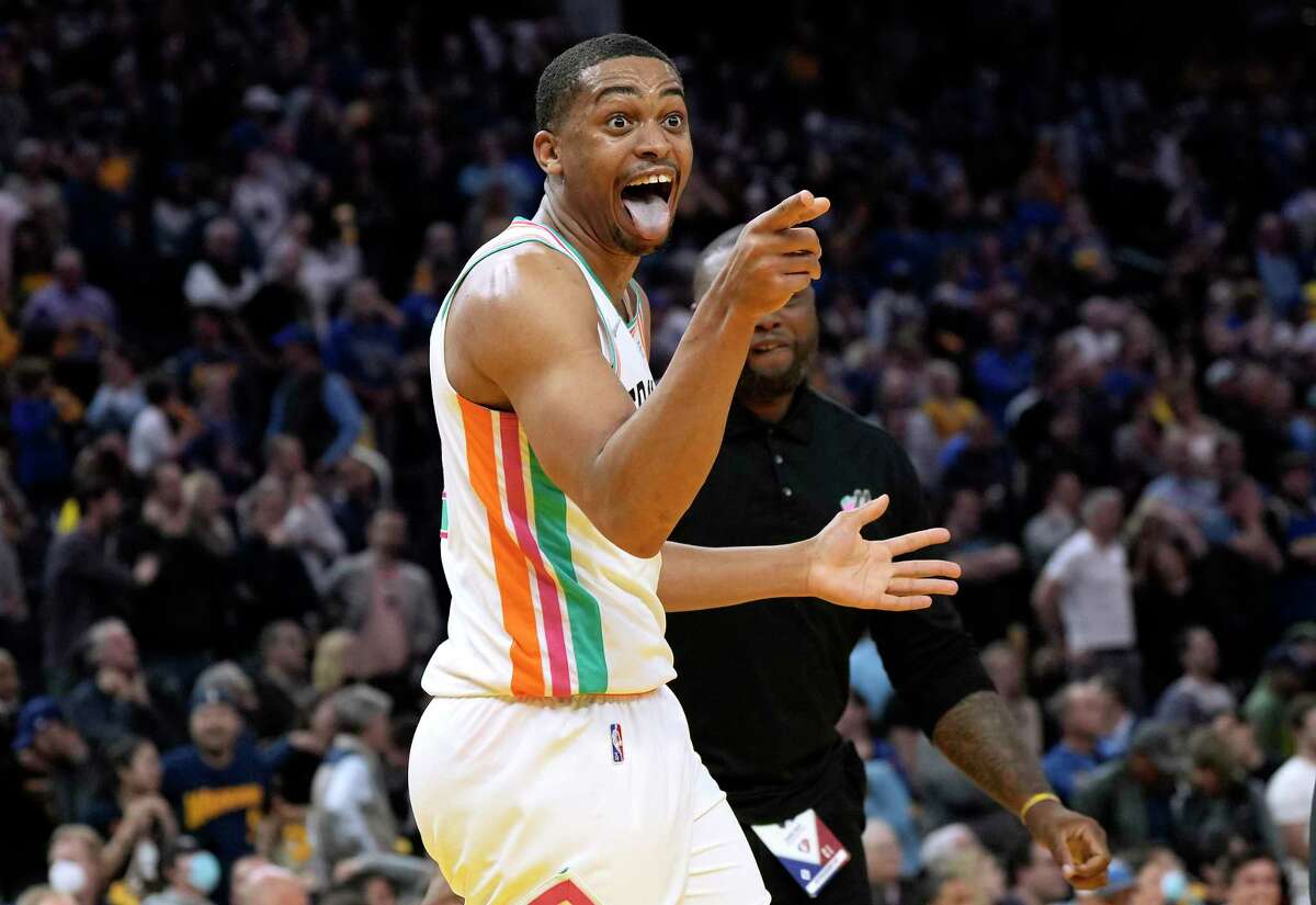 SAN FRANCISCO, CALIFORNIA - MARCH 20: Keldon Johnson #3 of the San Antonio Spurs celebrates after he got an offensive rebound and put back bucket to take the lead against the Golden State Warriors late in the fourth quarter of an NBA basketball game at Chase Center on March 20, 2022 in San Francisco, California. NOTE TO USER: User expressly acknowledges and agrees that, by downloading and or using this photograph, User is consenting to the terms and conditions of the Getty Images License Agreement. (Photo by Thearon W. Henderson/Getty Images)