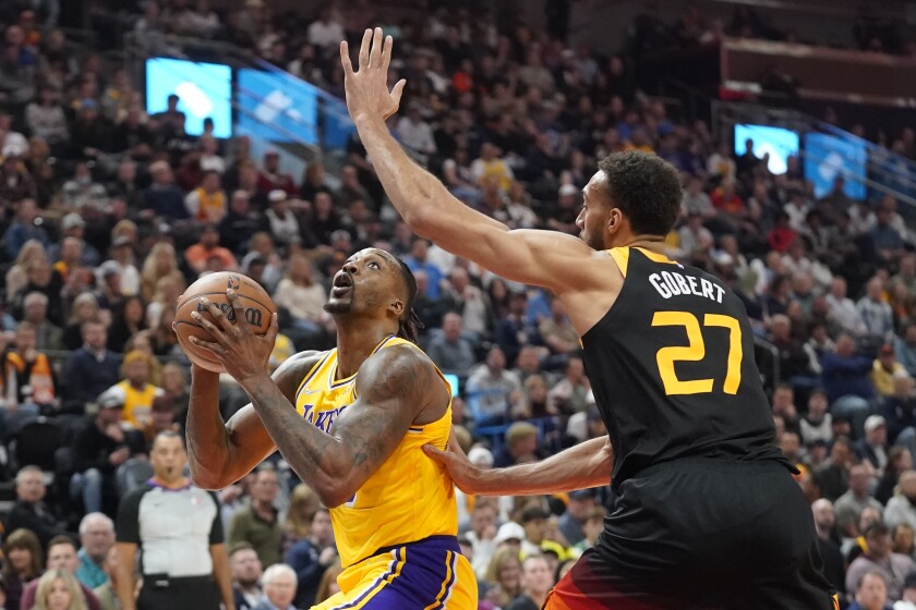 Lakers center Dwight Howard looks to shoot in front of Utah Jazz center Rudy Gobert.
