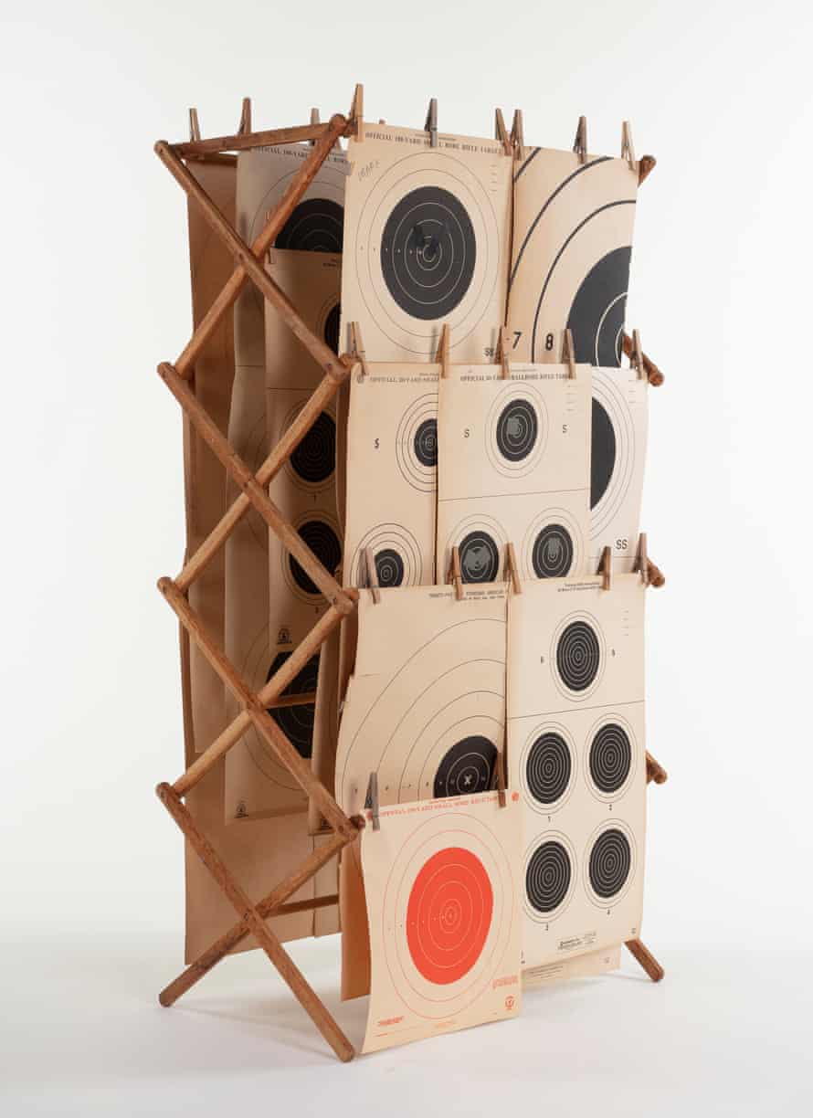 Lonnie Holley, Hung Out III, 2020, wooden clothes rack, wooden pegs and paper rifle targets, 144.5 x 75.5 x 42 cm
