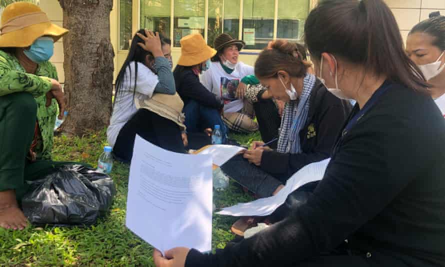 Members of the 'Friday wives' prepare to sign a petition calling for their jailed husbands' release in front of Phnom Penh's Australian embassy.