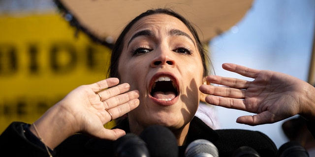 Rep. Alexandria Ocasio-Cortez, D-N.Y., speaks during a rally for immigration provisions to be included in the Build Back Better Act outside the U.S. Capitol, Dec. 7, 2021 in Washington.