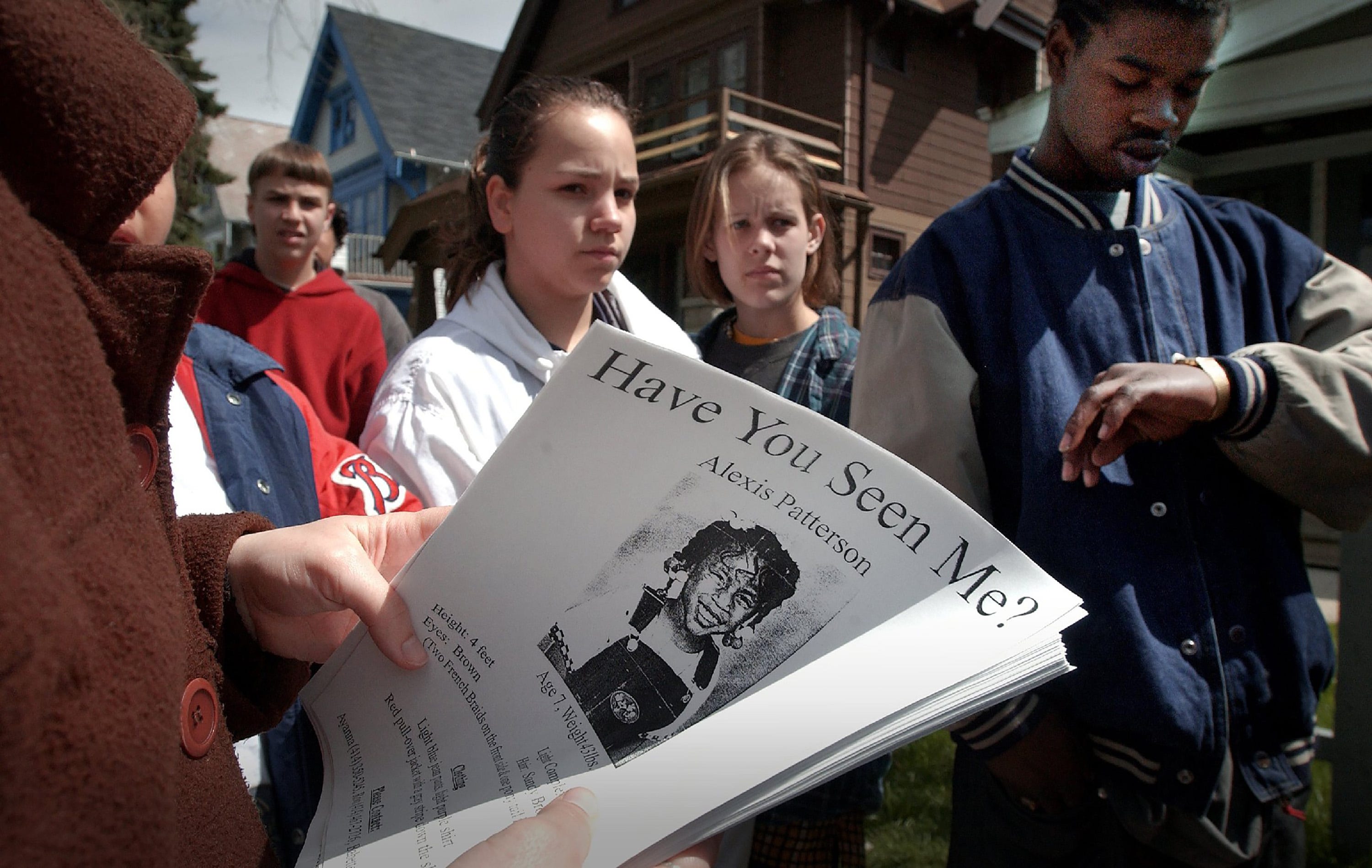 GIRL, NEW, TOM LYNN, 5 of 6.-Student volunteers from El Puente High School gather on N. 49th St. infront of Alexis Patterson's home ready to distribute posters and help in the search for the missing girl Tuesday May 7, 2002.