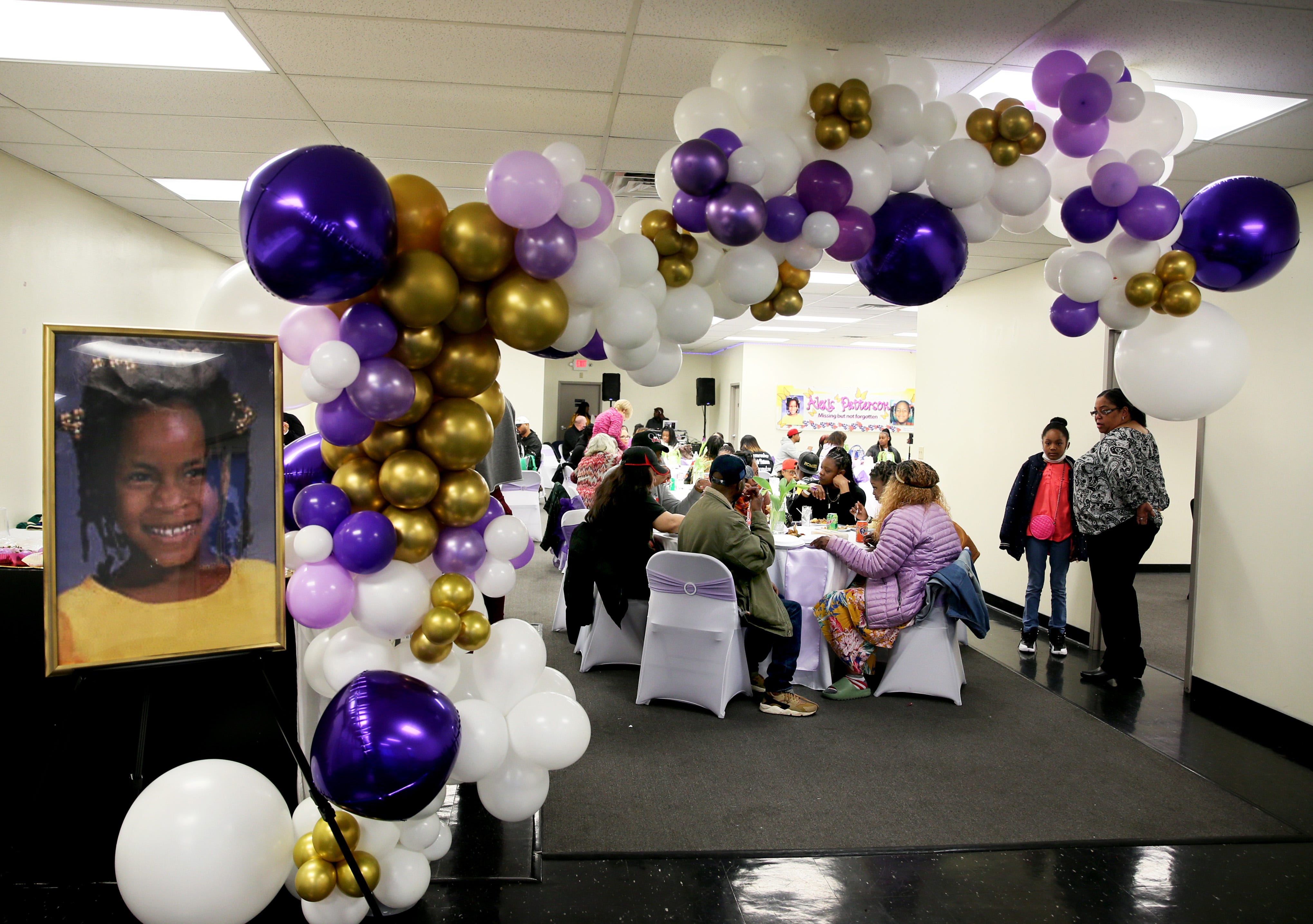 A photo of Alexis Patterson is displayed at a program marking the 20th year of her disappearance. About 100 people attended the event, which Ayanna Patterson, the mother of Alexis, called an “Awakening,” to partake in prayer, poetry, music and a banquet on Sunday, May 1, 2022 in Milwaukee.