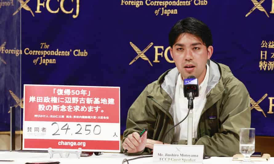 Jinshiro Motoyama speaks at a news conference in Tokyo urging and to the construction of a new military base in Henoko.