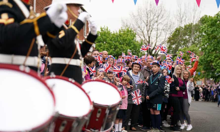 Members of the Royal Marines Band Service surprise residents of Church Hill in Redditch, near Birmingham, as they play a medley of tunes to recognise the community for stepping up to celebrate Queen Elizabeth’s Platinum Jubilee this June, with over 40 Big Jubilee Lunches planned to bring neighbours together on local streets.