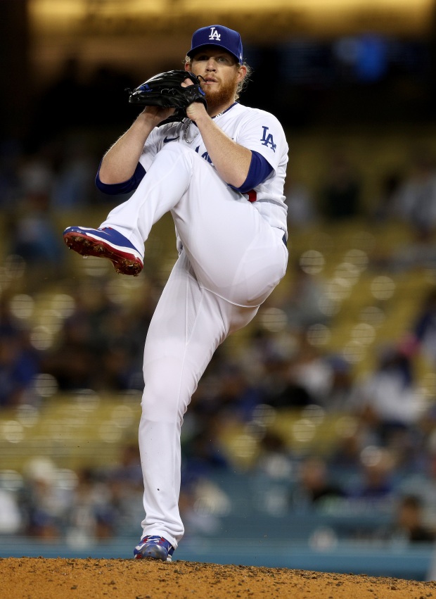 Dodgers relief pitcher Craig Kimbrel throws to the plate during...