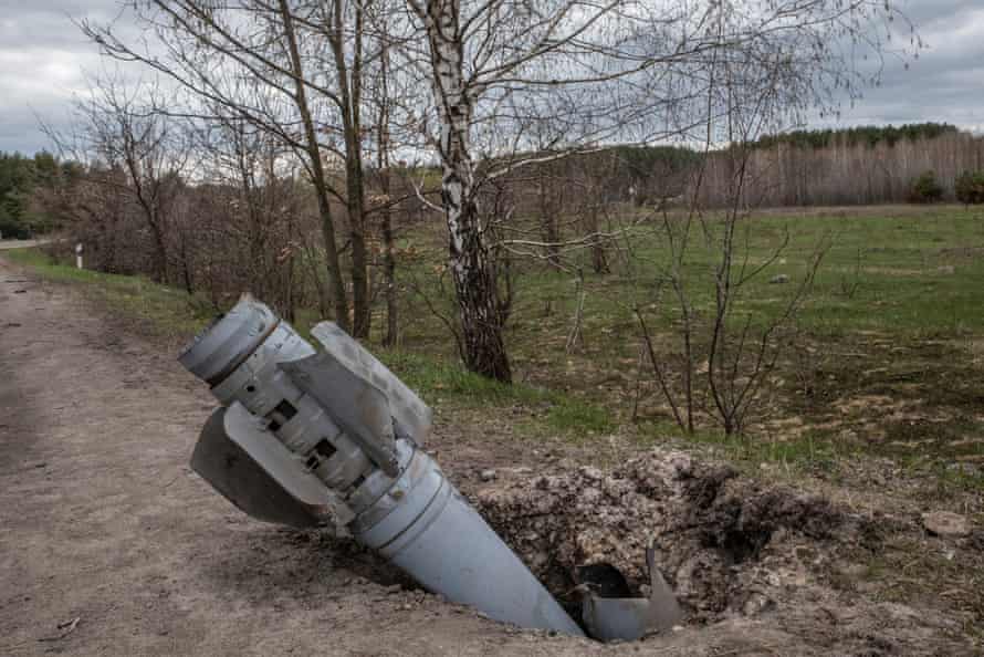 A Russian cluster rocket used to propel cluster munition, after landing in the countryside of Hostomel, a few miles from Bucha.