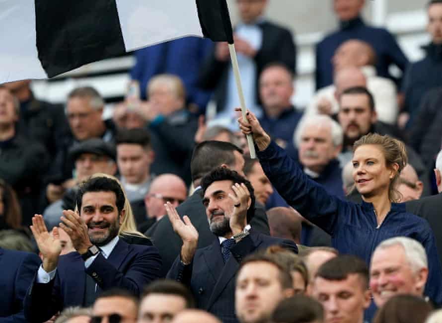 Yasir al-Rumayyan, the Saudi chairman of Newcastle (centre), with the directors Amanda Staveley and Mehrdad Ghodoussi at St James' Park last month.
