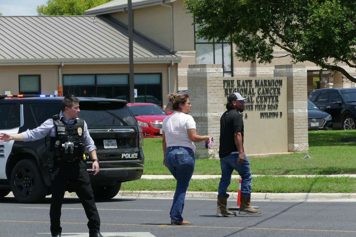 People arrive at Uvalde Memorial Hospital following a deadly mass shooting at nearby Robb Elementary School.