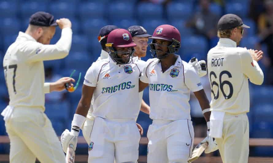 Kraigg Brathwaite and John Campbell celebrate West Indies defeating England by 10 wickets on day four of the third Test at the National Cricket Stadium in St George, Grenada, on Sunday 17 March 2022.
