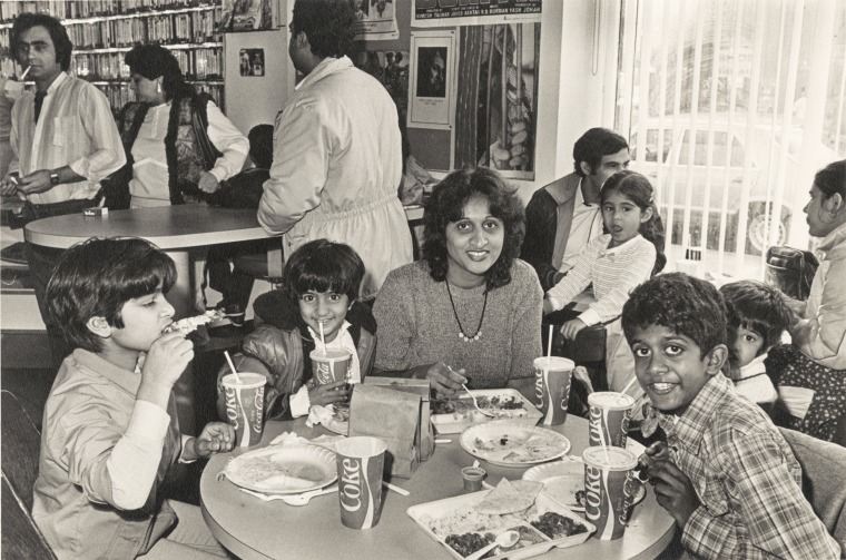 People eating at Food and Flavor on Devon Avenue in Chicago, December 1984.