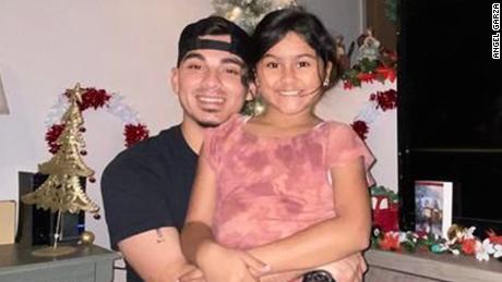 "I just want to know what she did to be a victim," Angel Garza said of the shooting death of his daughter, Amerie Jo Garza, 10.