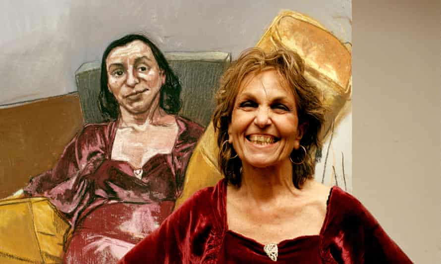 Paula Rego stands in front of one of her paintings