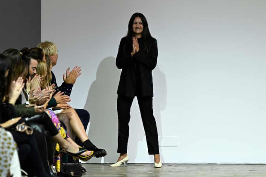 Gabriella Pereira wears an all black outfit with cream shoes and crystal heals at her 2022 runway show during Australian fashion week.