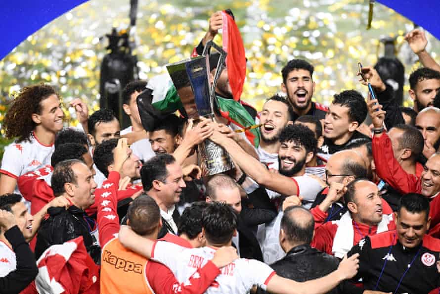 Tunisia celebrate with the Kirin Cup after beating Japan in Osaka.