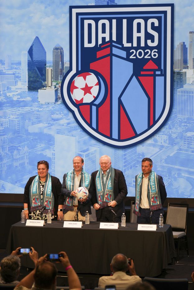 Monica Paul, Dan Hunt, Jerry Jones and Nico Estevez pose with Dallas World Cup scarves...
