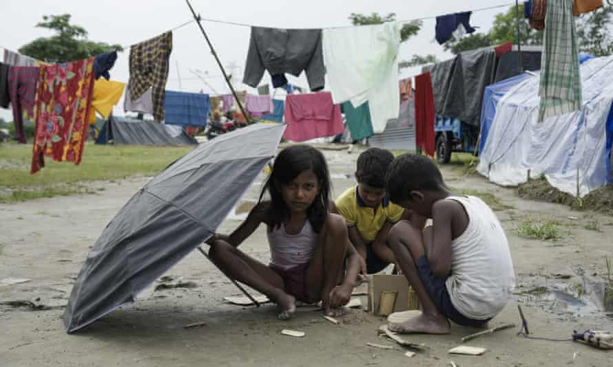 Children play at a makeshift camp in Barpeta