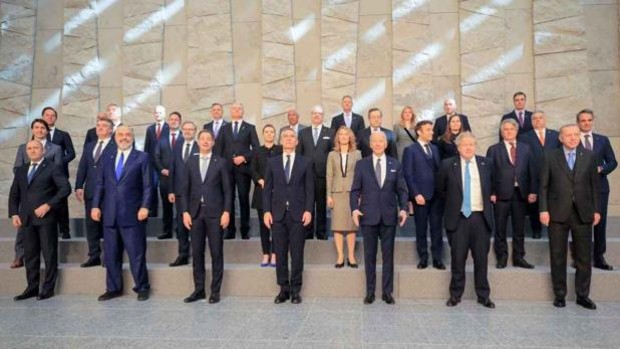 Group photo of the last NATO Summit held in Brussels on March 24